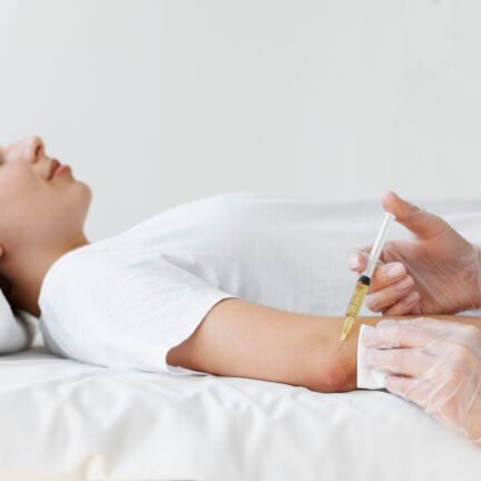 side-view-woman-getting-elbow-prp-treatment